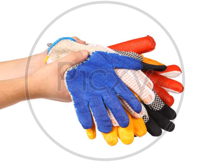 Rubber Gloves In A Hand. Isolated On A White Background