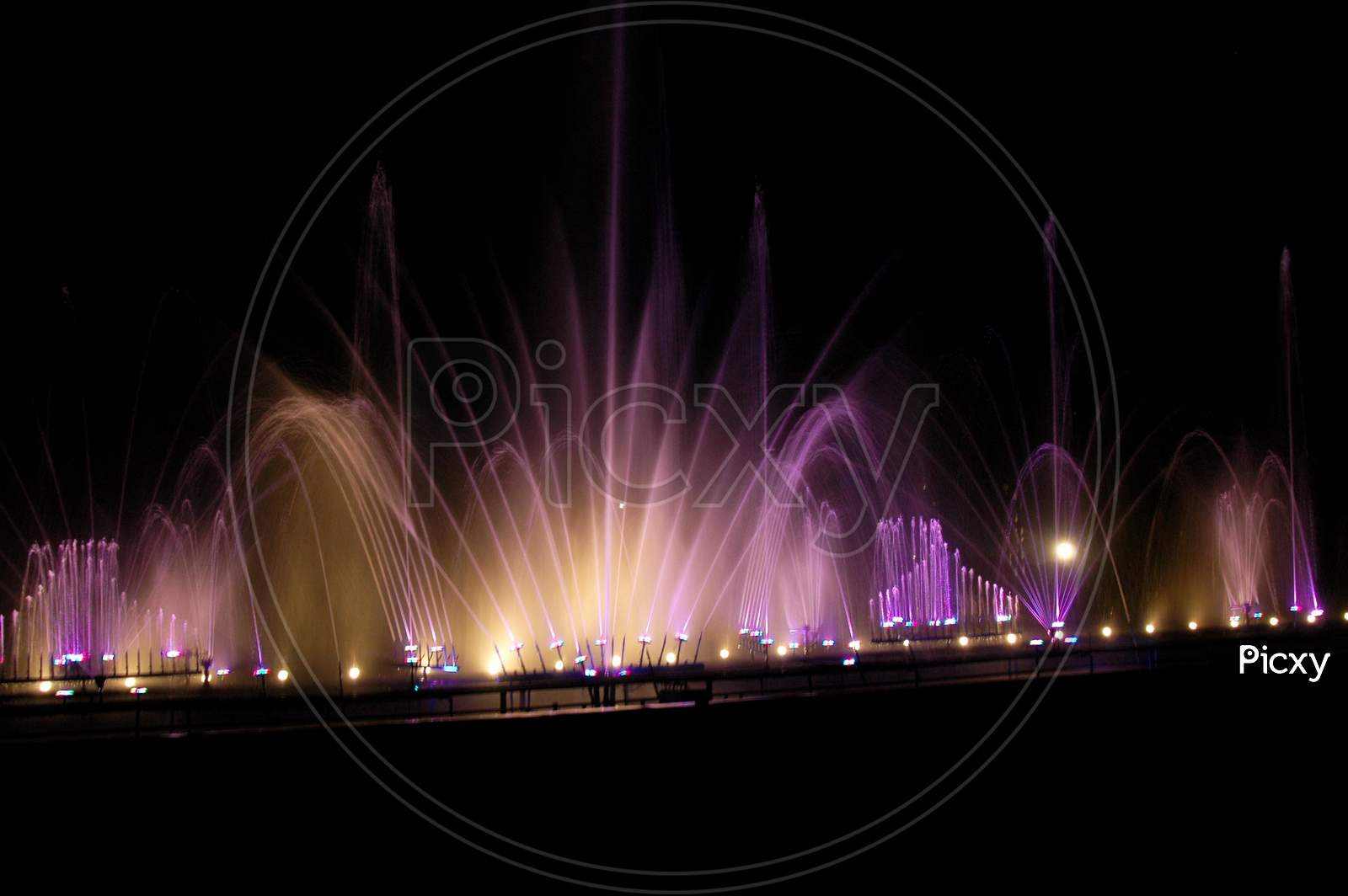Musical fountain with colorful illuminations at night