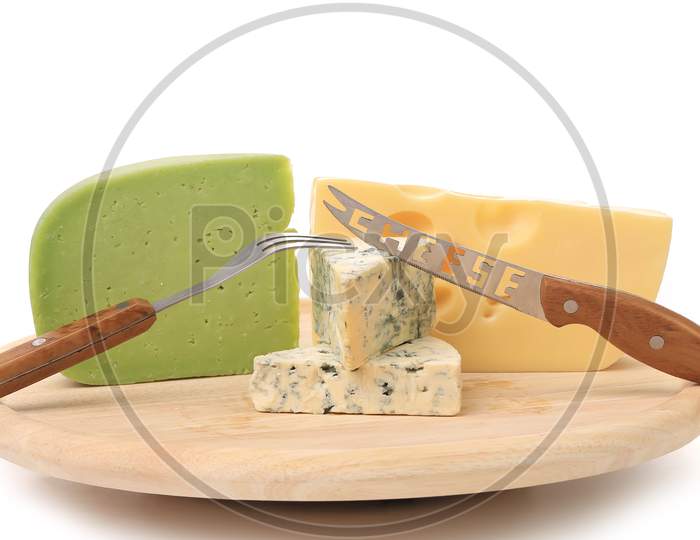 Various Types Of Cheeses On Wood. With Knife. White Background