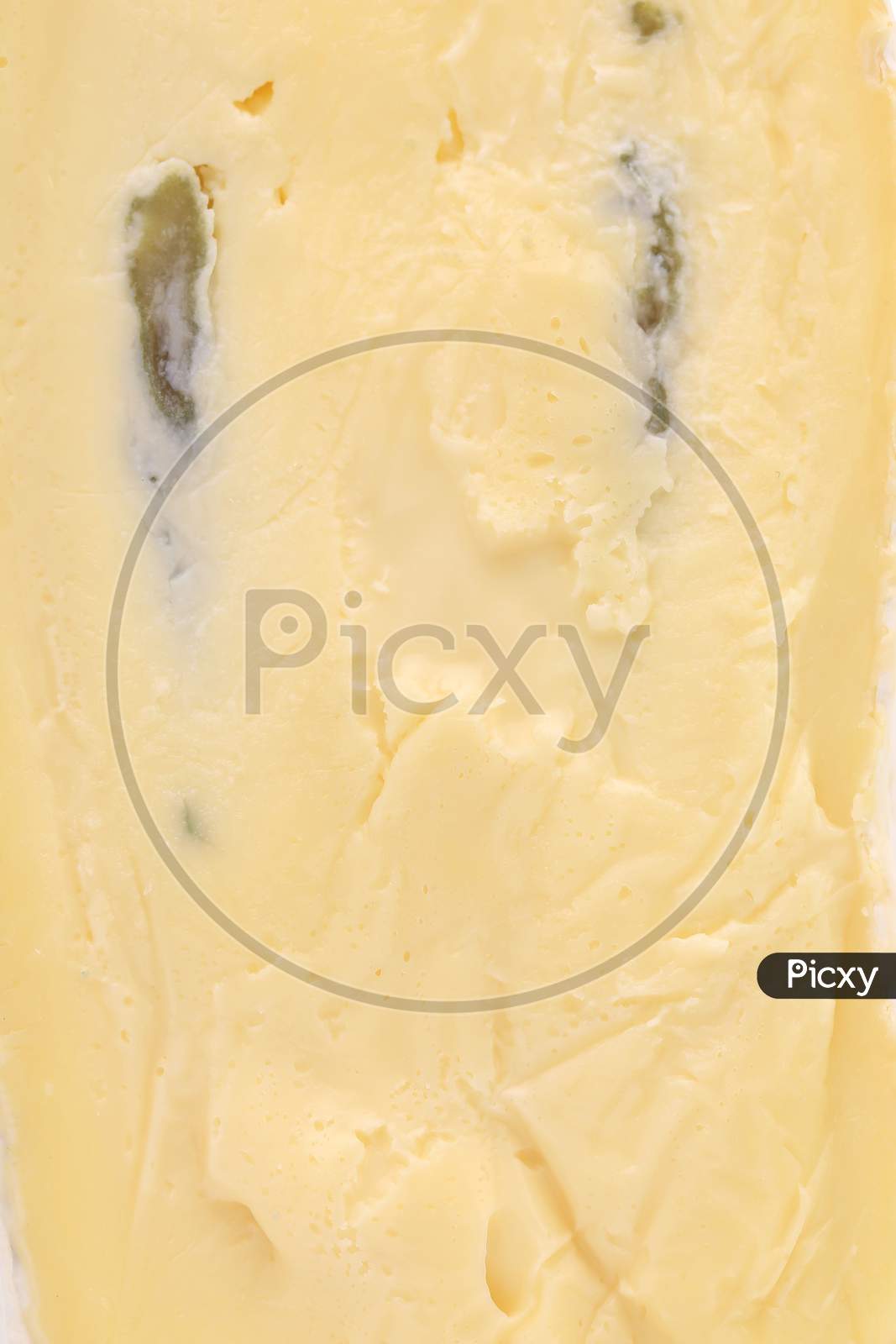 Close Up Of Cheese Texture. Whole Background