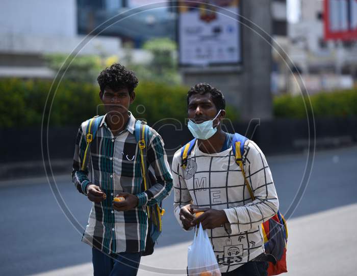 Migrant workers from Ghorakhpur, Uttar Pradesh  working at construction sites in Shaikpet, Hyderabad walk towards their hometowns amid nationwide lockdown as their employers abandoned them