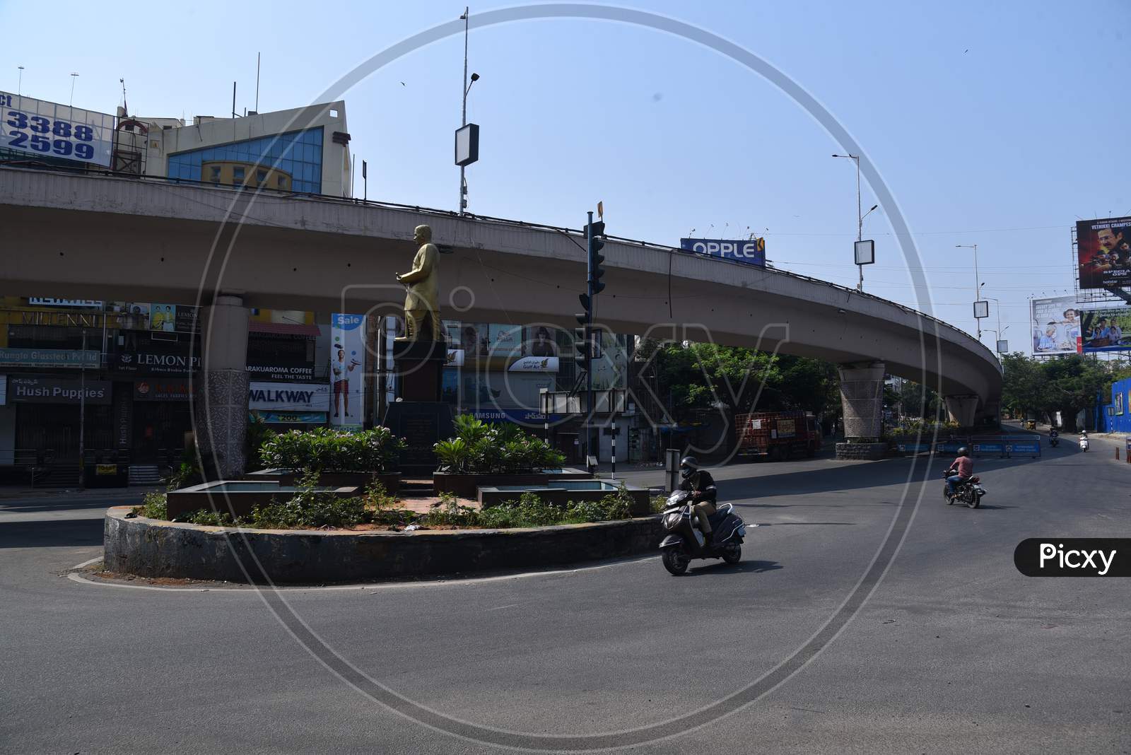 vehicles move on deserted Nagarjunna Circle in Punjagutta, amid nationwide lockdown due to corona virus pandemic outbreak
