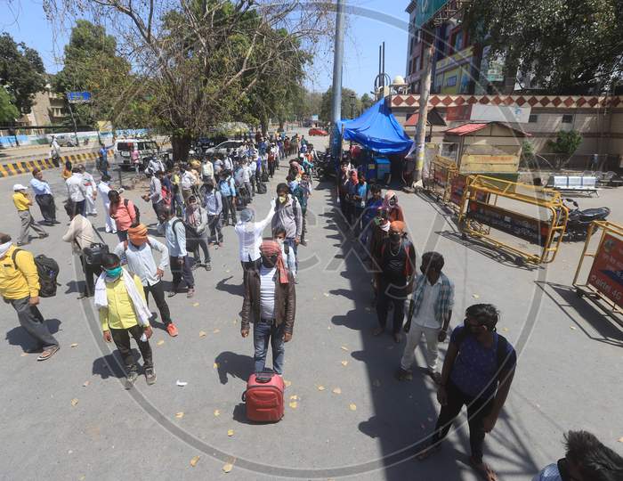 Migrant Workers Waiting In Queue Lines For Medical Examining  , Who Are  Returning To Their Villages To Limit The Spread The Corona Virus Disease ( COVID-19) in Prayagraj. March 29 , 2020