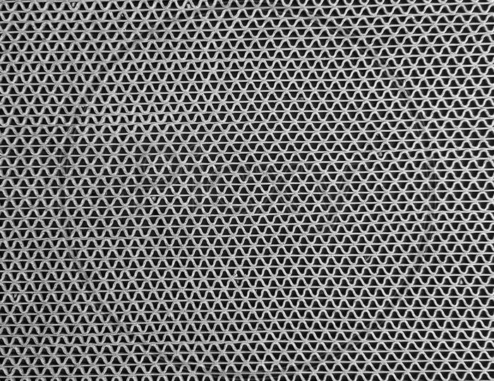 Monochrome Wire Metallic Seamless Pattern Grid Wall Background.