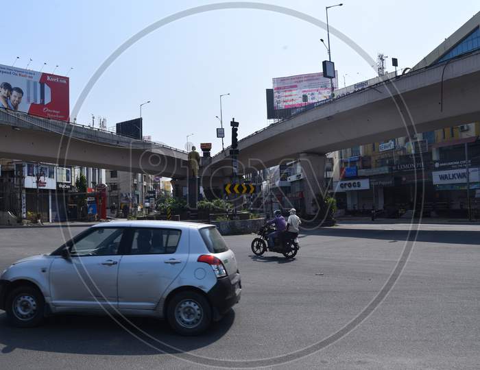 a car moves on deserted Nagarjunna Circle in Punjagutta, amid nationwide lockdown due to corona virus pandemic outbreak