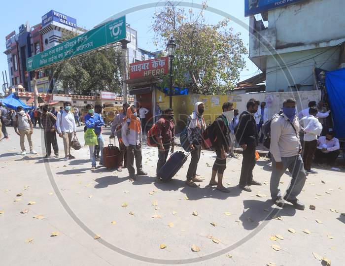 Migrant Workers Waiting In Queue Lines For Medical Examining  , Who Are  Returning To Their Villages To Limit The Spread The Corona Virus Disease ( COVID-19) in Prayagraj. March 29 , 2020