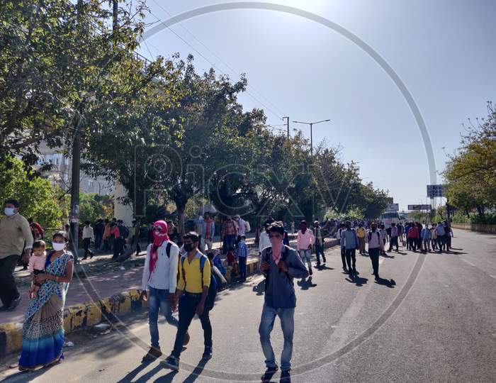 Migrant Workers Walking  Towards KMP Expressway In Delhi Heading To Their Home Towns Or Villages  As They Remain Unemployed Due To Sudden Lock Down Situation For Corona Virus Or COVID 19  Outbreak