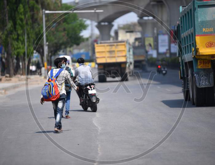 Migrant workers from Ghorakhpur, Uttar Pradesh  working at construction sites in Shaikpet, Hyderabad walk towards their hometowns amid nationwide lockdown as their employers abandoned them