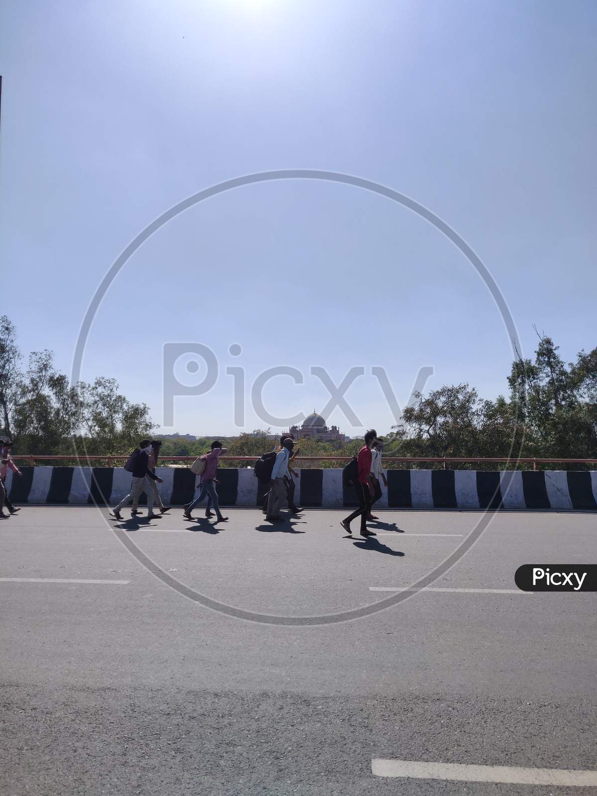 Migrant Workers Walking  Towards KMP Expressway In Delhi Heading To Their Home Towns Or Villages  As They Remain Unemployed Due To Sudden Lock Down Situation For Corona Virus Or COVID 19  Outbreak