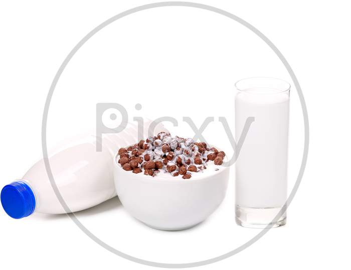 Bowl Of Corn Flakes And Milk. Isolated On A White Background.