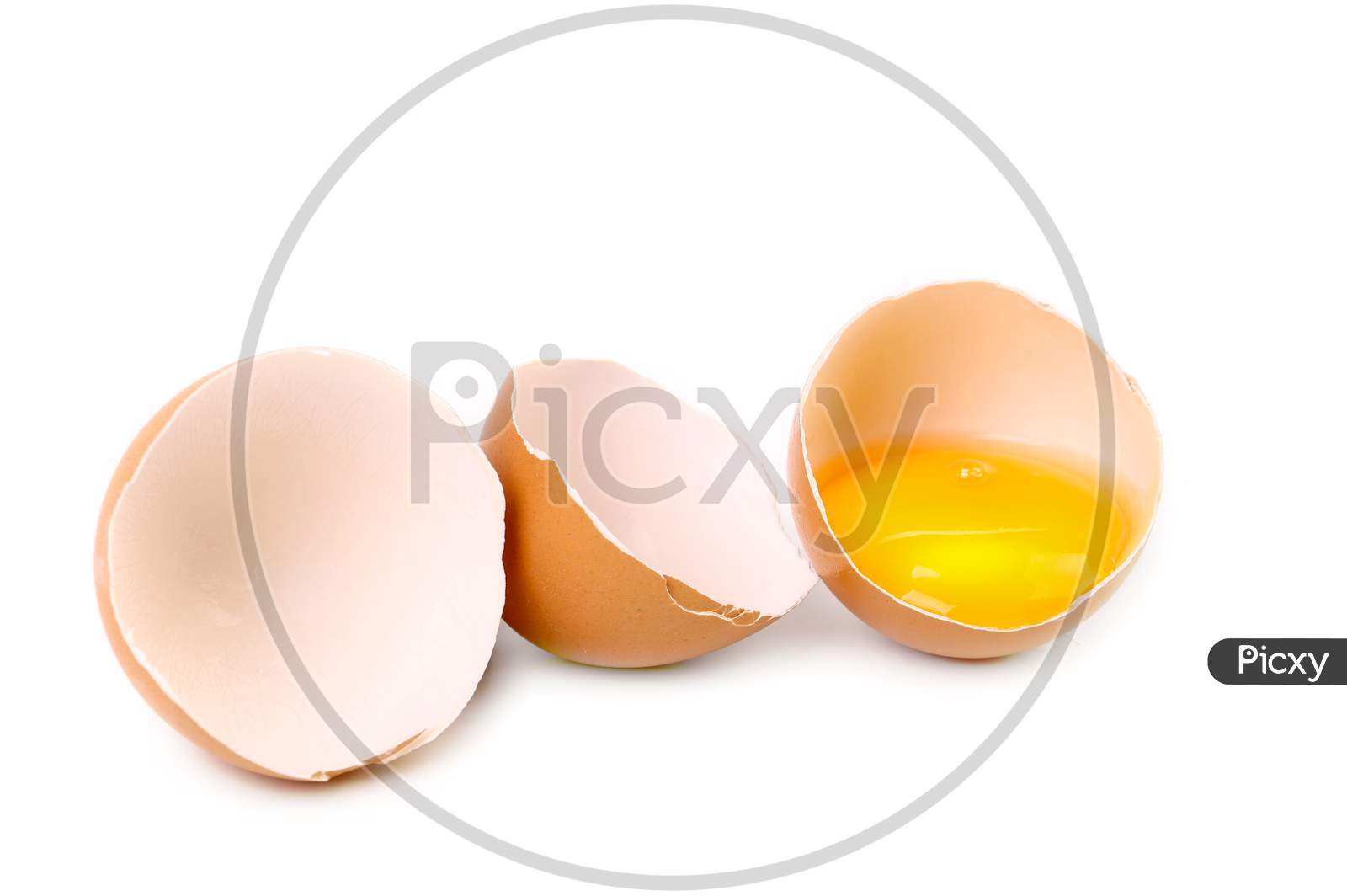 Close Up Of Broken Egg Half. Isolated On A White Background.