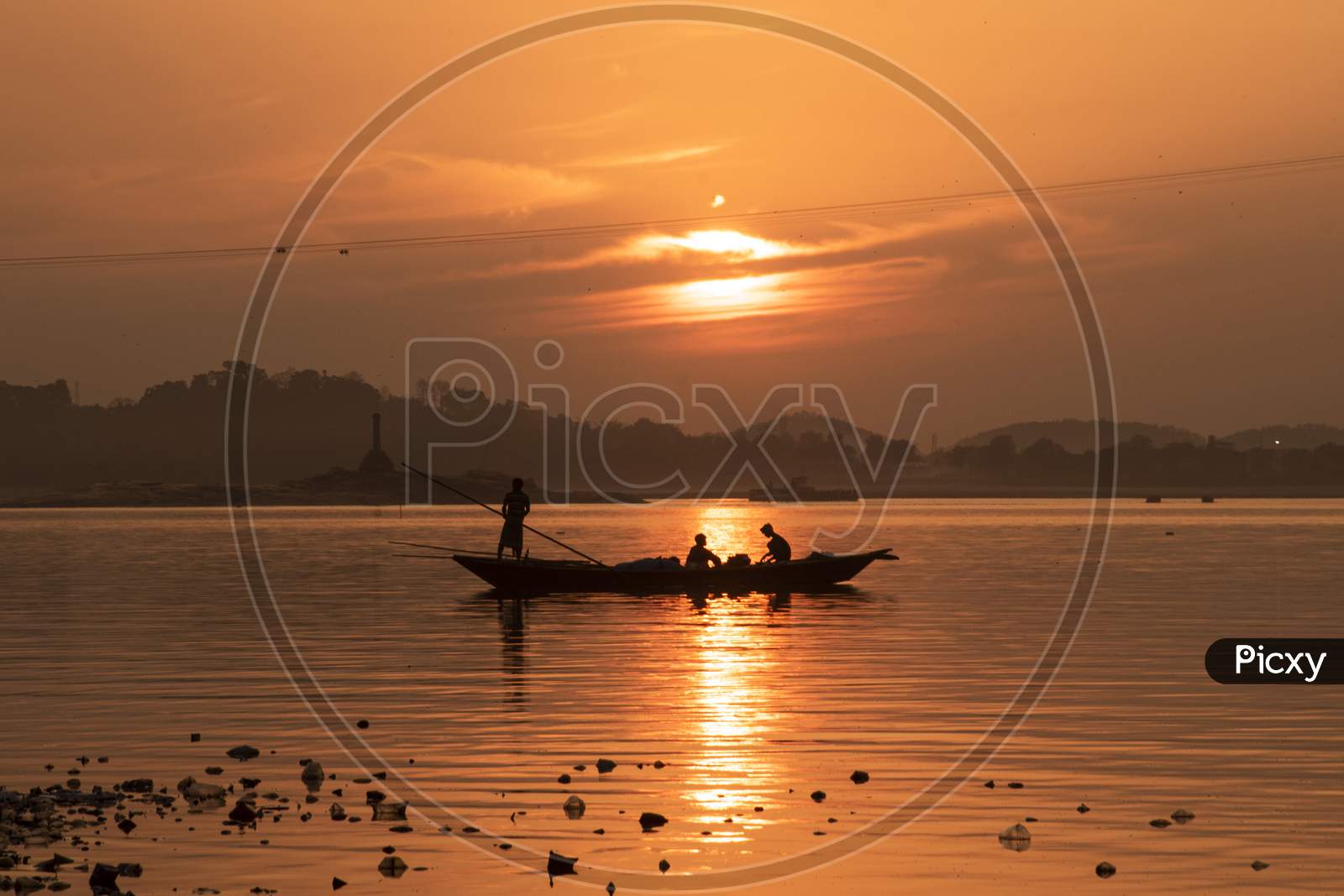 Fishermen Fishing In The Brahmaputra River At Sunset, In Guwahati On 29 Feb. 2020