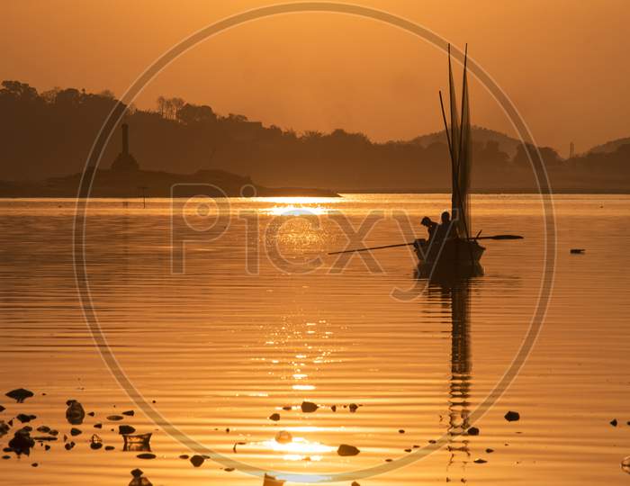 Fishermen Fishing In The Brahmaputra River At Sunset, In Guwahati On 29 Feb. 2020.