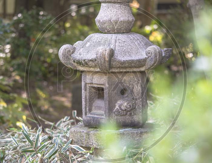 Stone Lantern In The Garden Of Shibusawa Museum Of Asukayama Park In The Kita District Of Tokyo, Japan.It Is Part Of One Of The Three Museums In Asukayama Park And Was Build In 1925.