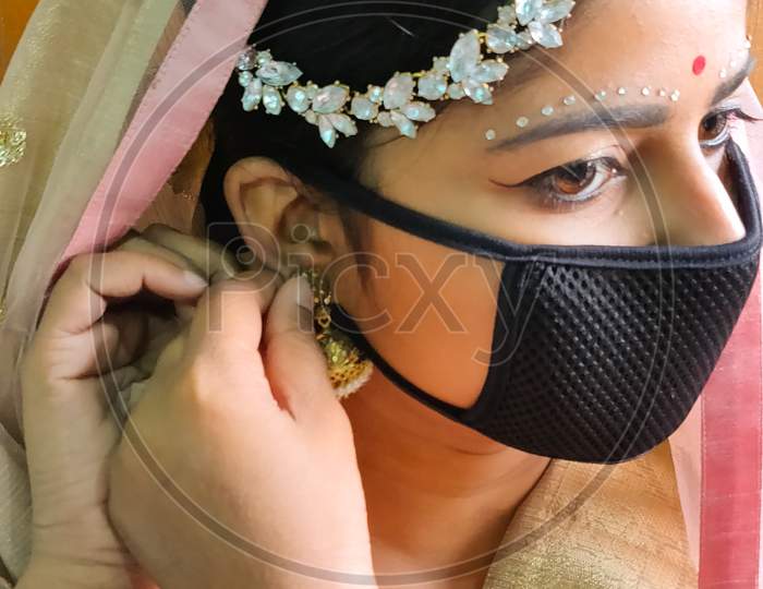 Bride with mask for protection from corona virus
