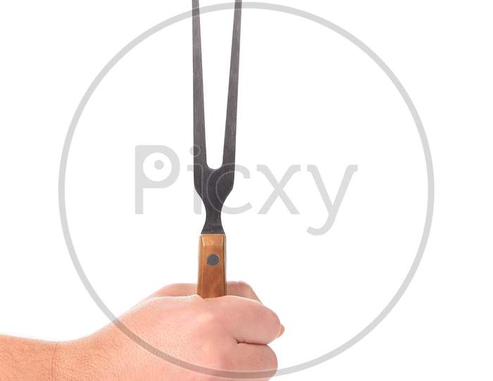 Close Up Of Cheese Fork In Hand. Isolated On A White Background.