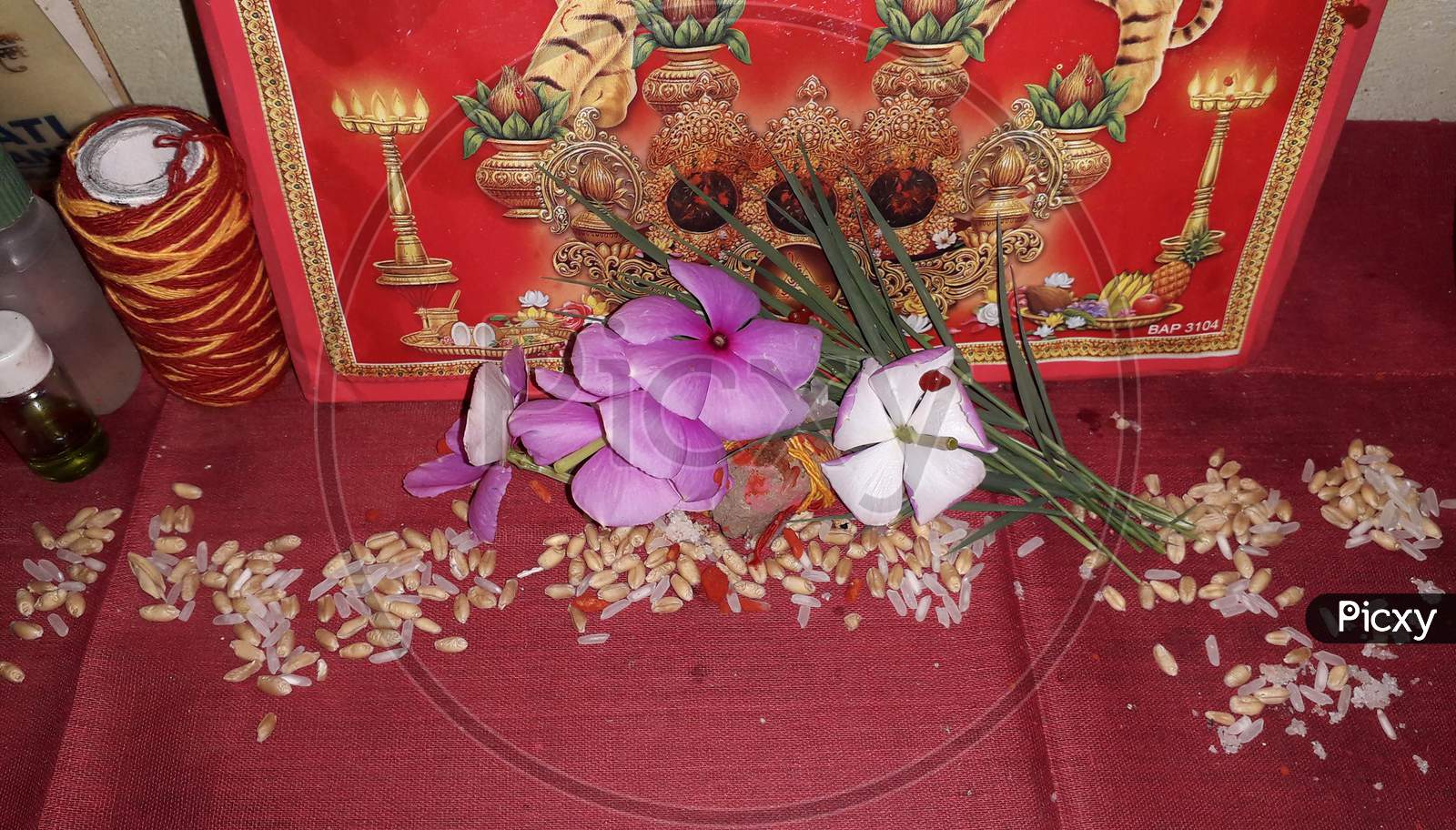 Flowers and grains in front of Hindu goddess 'Durga' in 'Navratri' / pledge place of Hindus / devotion to Goddess