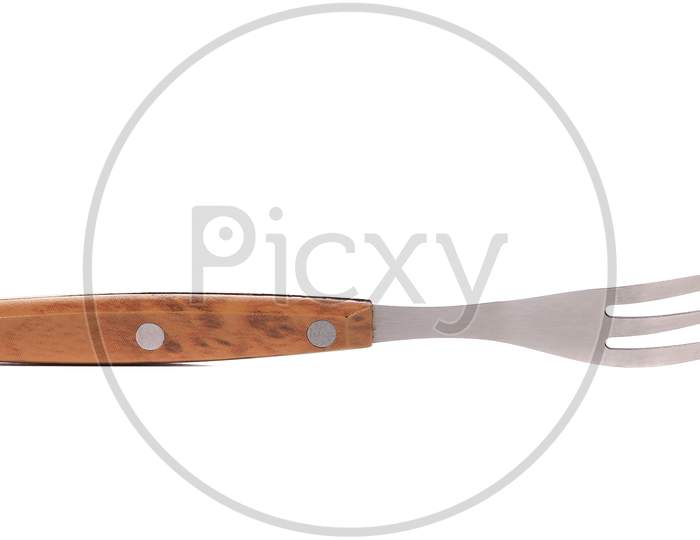 Close Up Of Kitchen Fork. Isolated On A White Background.