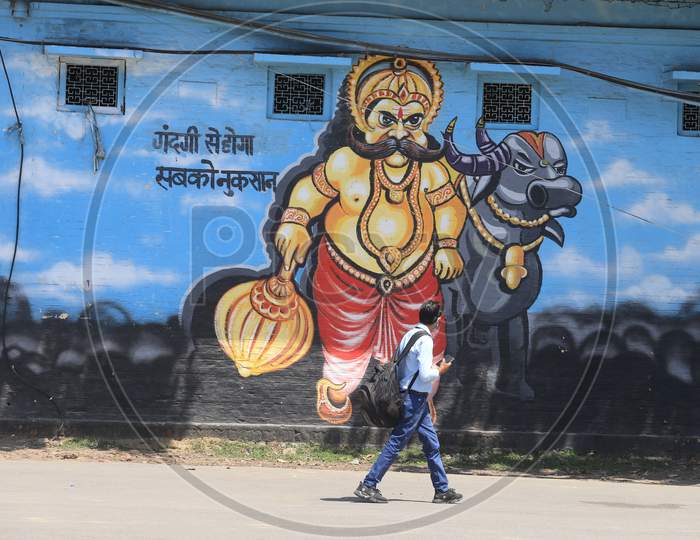 Wall Art Or Street Art Of Yama A Symbolic Of Death In India With Activities of People On Roads During Lock Down Period To Limit The Spread of Corona Virus Disease ( COVID-19)