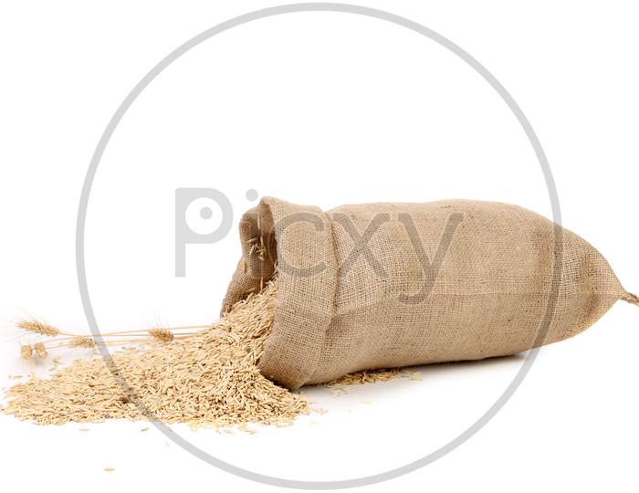 Sack With Grains And Ear Of Wheat. Isolated On A White Background.