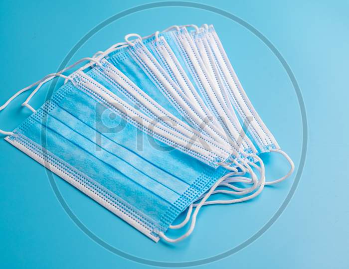 Covid-19 Protection Mask, Healthcare Mask On Blue Background