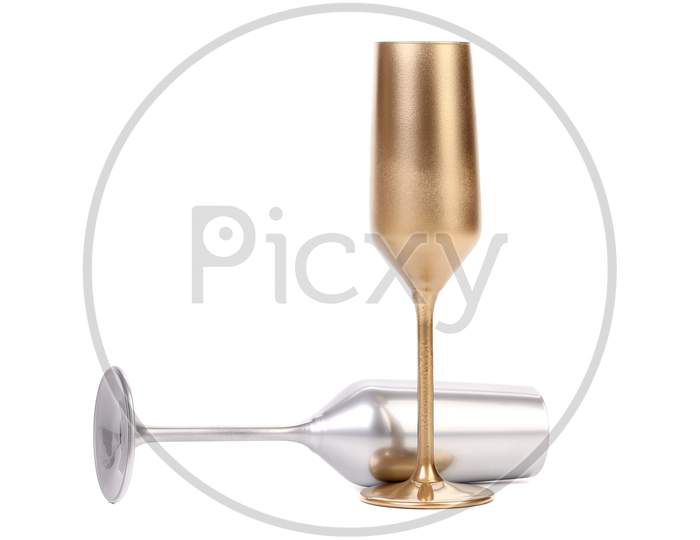 Golden And Silver Champagne Glasses. Isolated On A White Background.