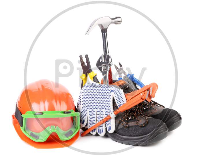 Working Tools In Boots. Isolated On A White Background.