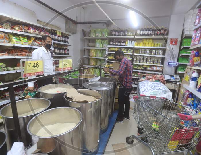 Super Markets Or Mall workers packing food items for door to door service during a 21-day nationwide lockdown to limit the spreading of coronavirus disease (COVID-19),  March 30, 2020.