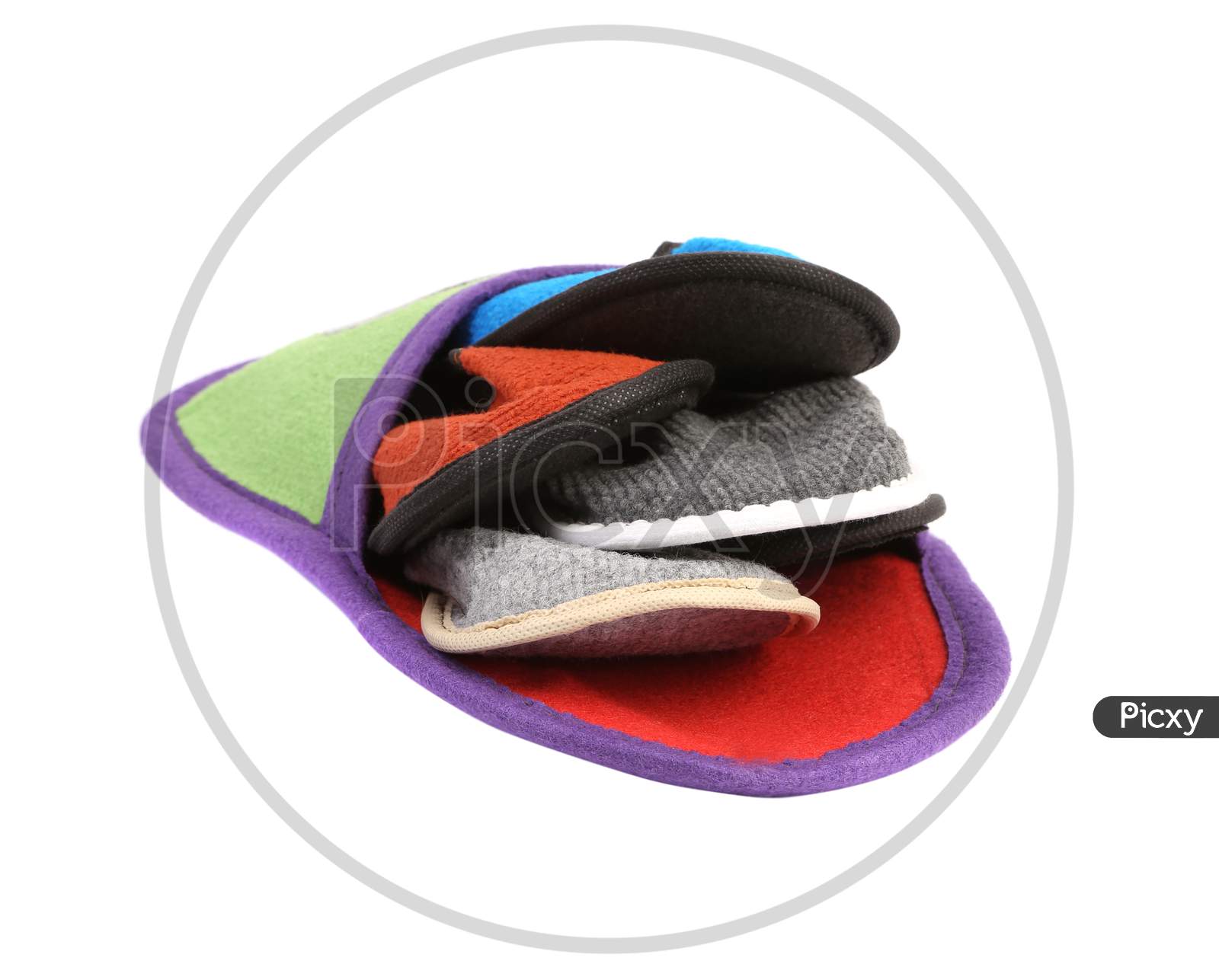 Colourful Slippers Into Big Slipper. Isolated On A White Background.