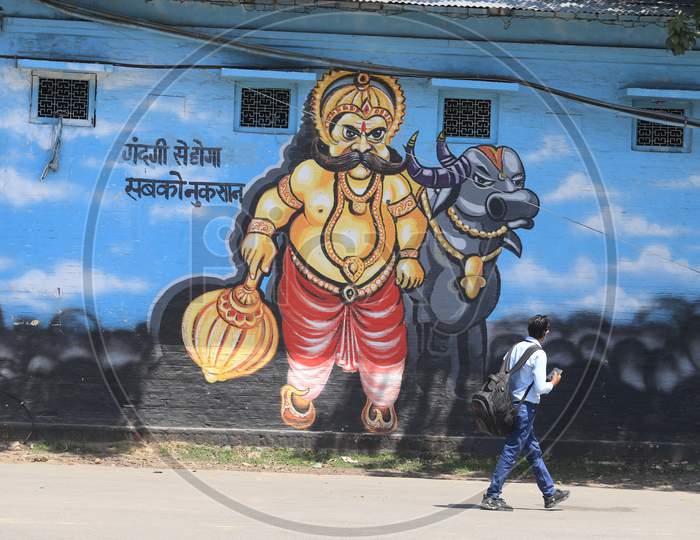 Wall Art Or Street Art Of Yama A Symbolic Of Death In India With Activities of People On Roads During Lock Down Period To Limit The Spread of Corona Virus Disease ( COVID-19)