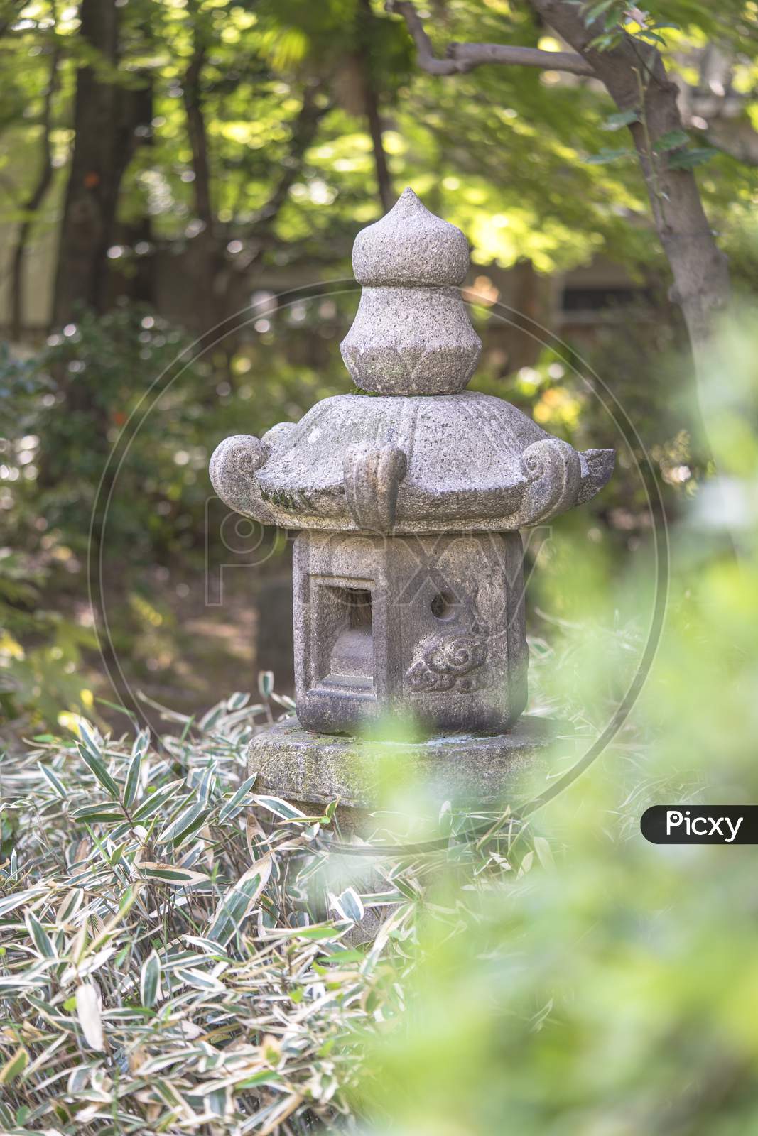 Stone Lantern In The Garden Of Shibusawa Museum Of Asukayama Park In The Kita District Of Tokyo, Japan.It Is Part Of One Of The Three Museums In Asukayama Park And Was Build In 1925.