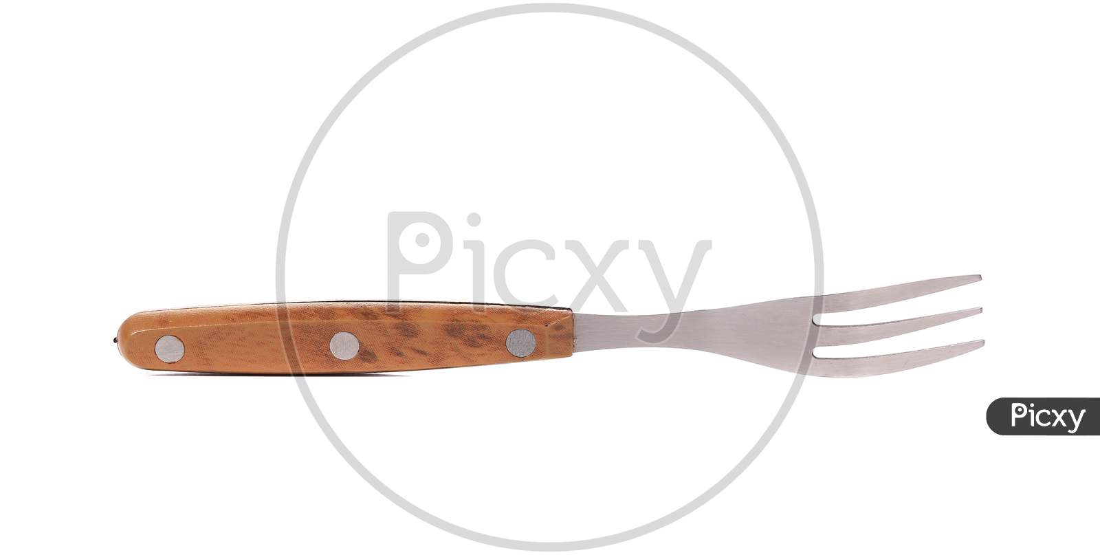 Close Up Of Kitchen Fork. Isolated On A White Background.