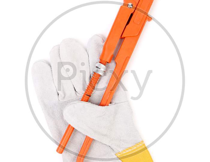 Construction Gloves And Gas Wrench. Isolated On A White Background.
