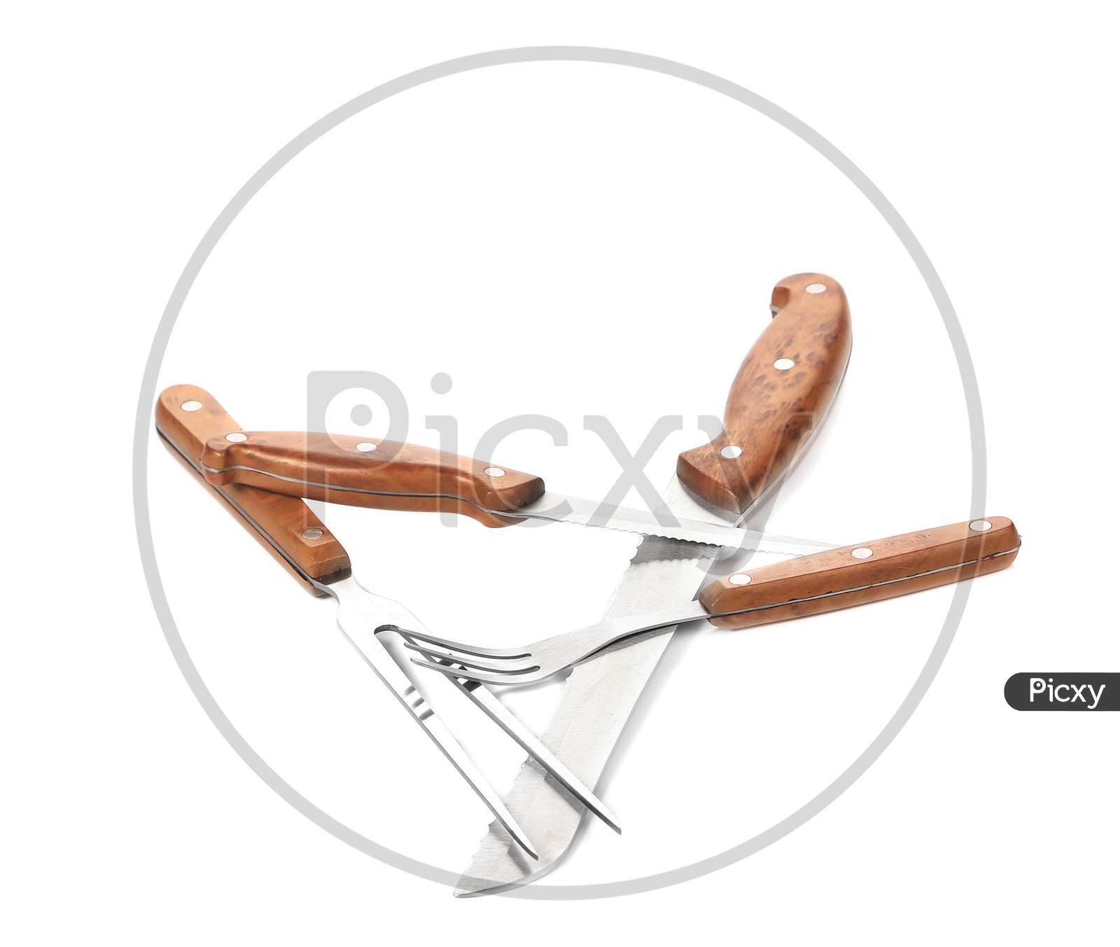 Kitchen Forks And Knifes. Isolated On A White Background.
