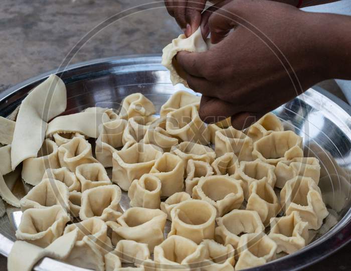 Guna is being prepared during the festival of Gangaur in Rajasthan, a rajasthani sweet dish
