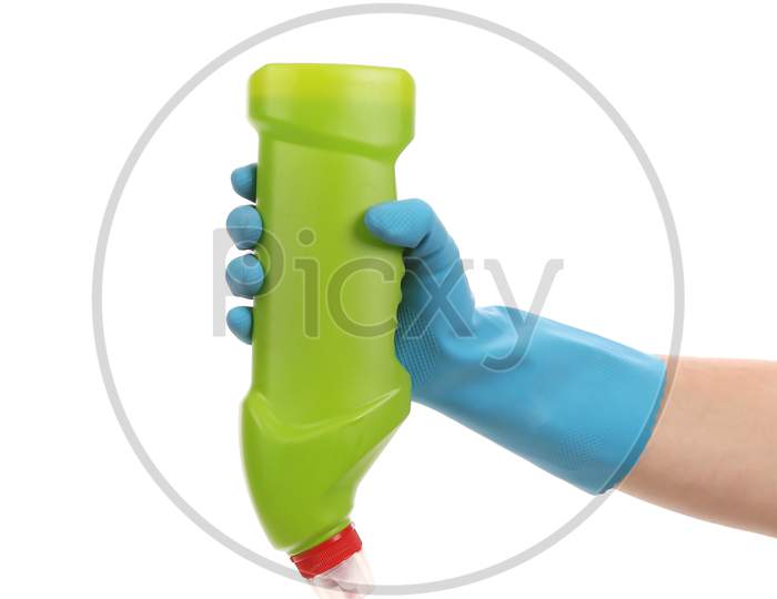 Hand In Glove Holding Green Bottle. Isolated On A White Background.