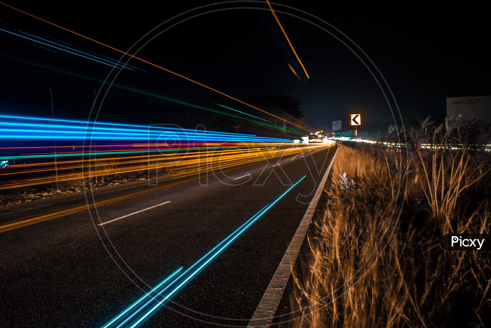 Light trail of vehicles passing in the national highway.