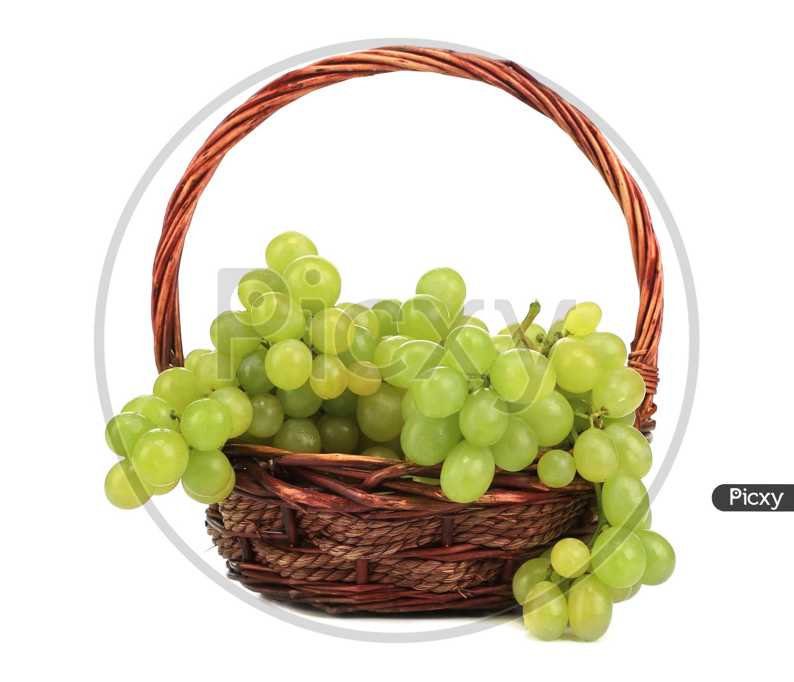 Green Ripe Grapes In Basket. Isolated On A White Backgropund.
