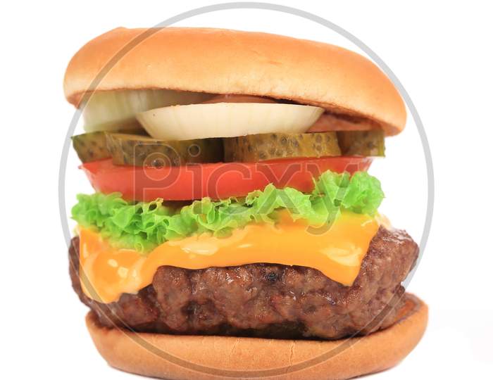 Big Appetizing Fast Food Hamburger. Isolated On A White Background.