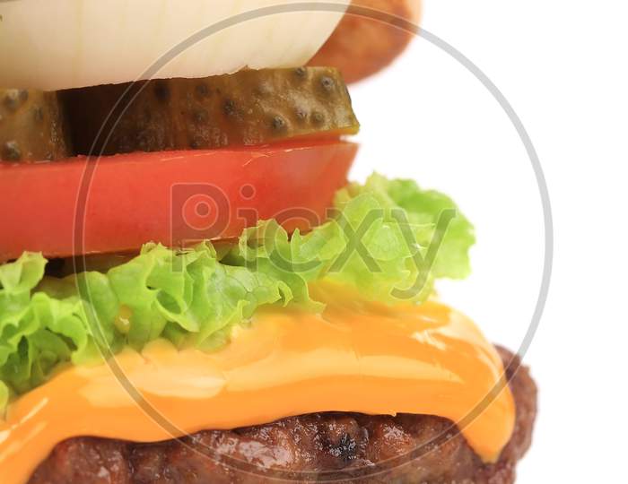 Big Appetizing Hamburger. Close Up. Whole Background.