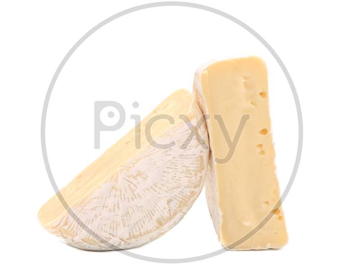 Two Pieces Of Cheese Brie. Isolated On A White Background.