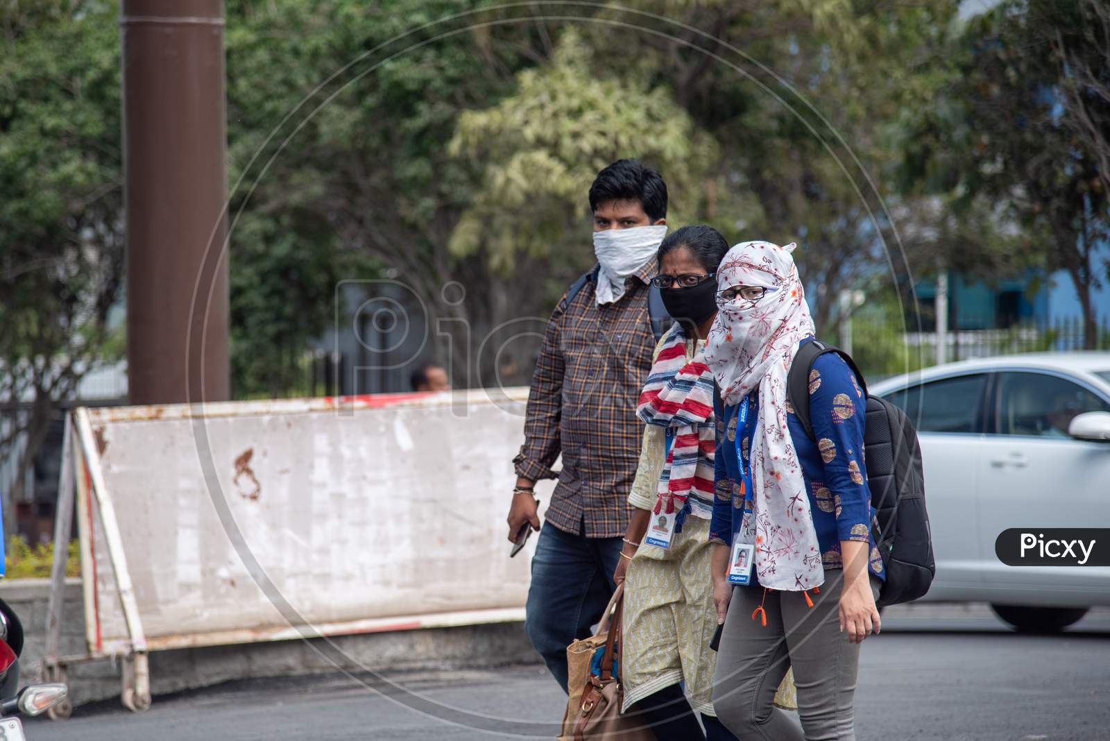 Employees wear preventive Face Masks to protect themselves from the Pandemic CoVID19, Corona Virus after the breakout of the news that an employee from Mindspace Building 20 is tested Positive.