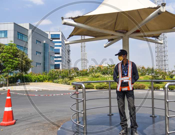 Security at Raheja Mindspace IT Park wearing protective Face masks as a preventive measure from CoVID19, Corona Virus.