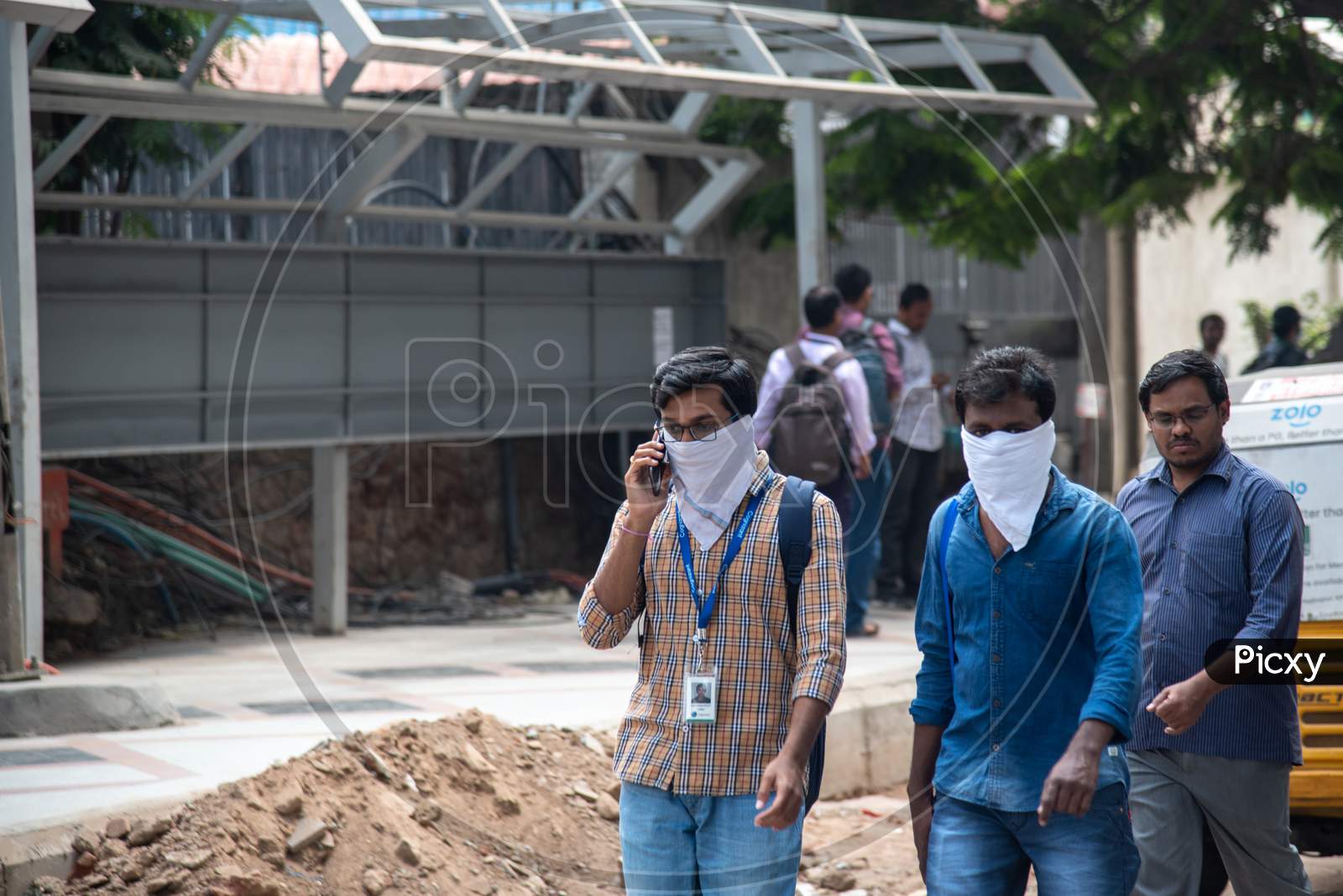 IT Employes use kerchief as a preventive measure from getting infected from CO-VID19, Corona Virus and started to evacuate Raheja Mindspace Campus as they were asked to evacuate the campus