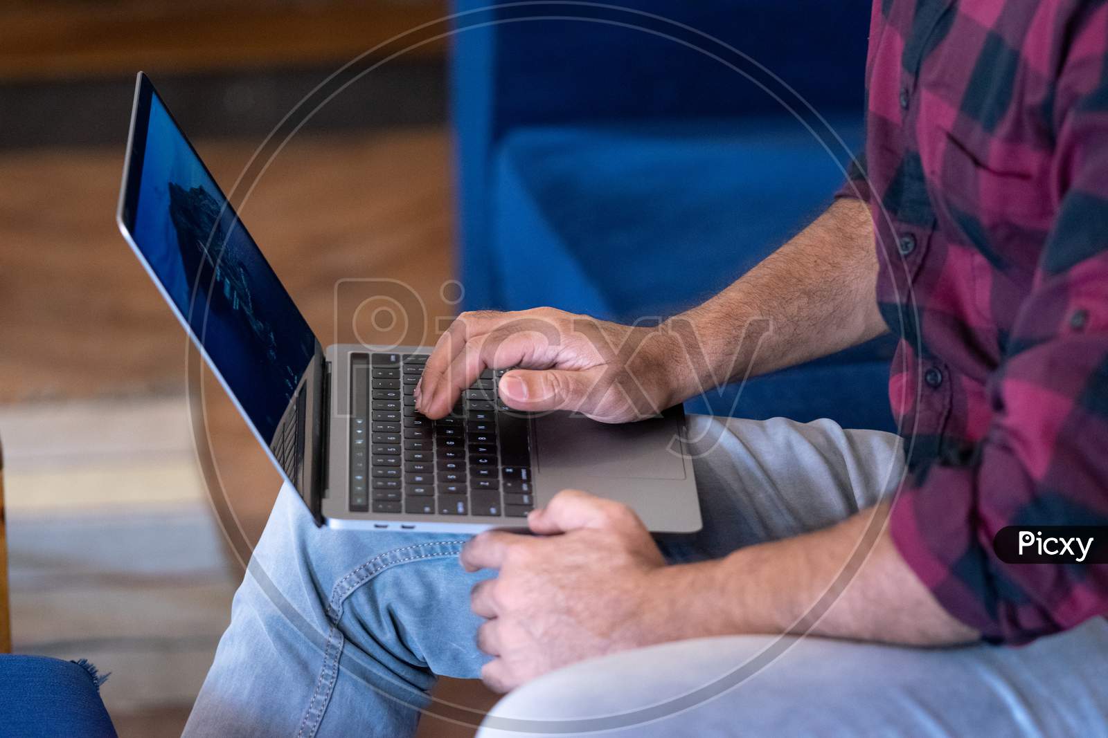 A man working with a laptop
