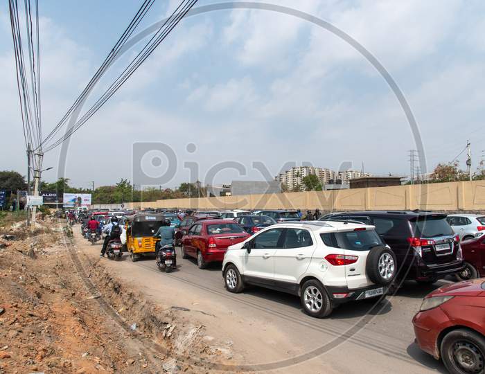 Heavy traffic congestion at Hitech City MMTS station Railway Underpass.