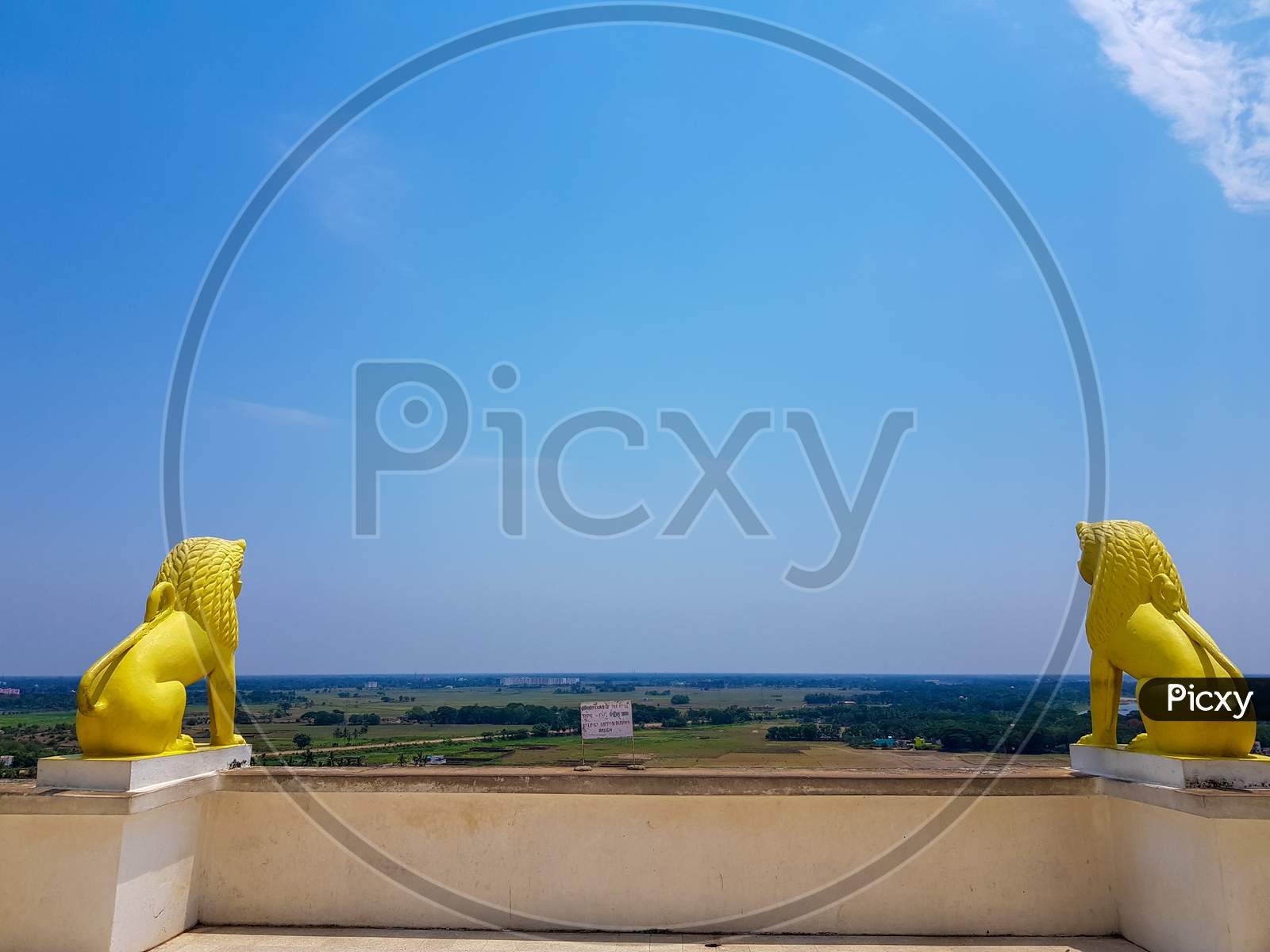 Skyline Of Odisa And Golden Lion Statues At Theview Point Of Dhauli Shanti Stupa At Odisha,India
