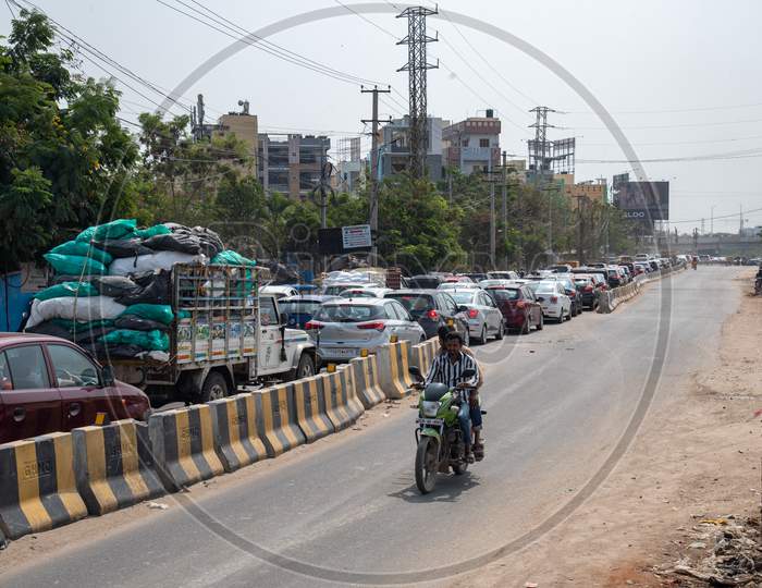 Heavy traffic congestion during peak hour on Hafeezpet-Hitech City MMTS station road