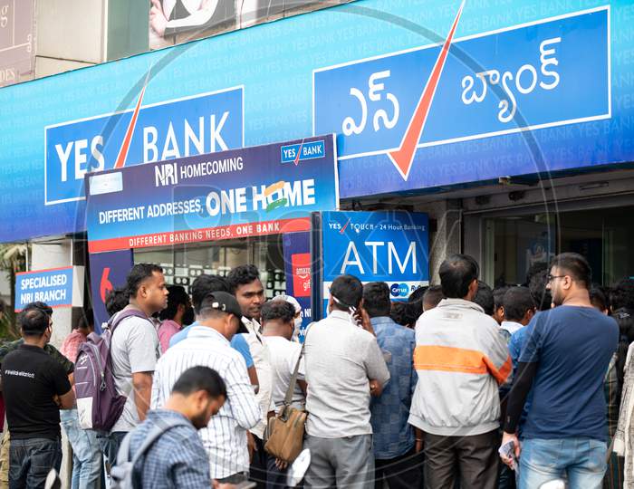 Customers Lined Up At Yes Bank ATMS and Banks Due To RBI Moratorium