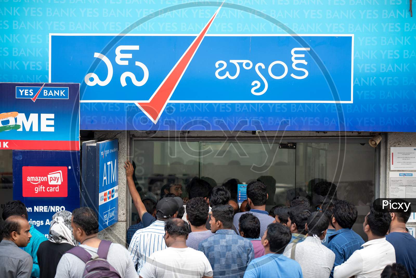 Customers Lined Up At Yes Bank ATMS and Banks Due To RBI Moratorium
